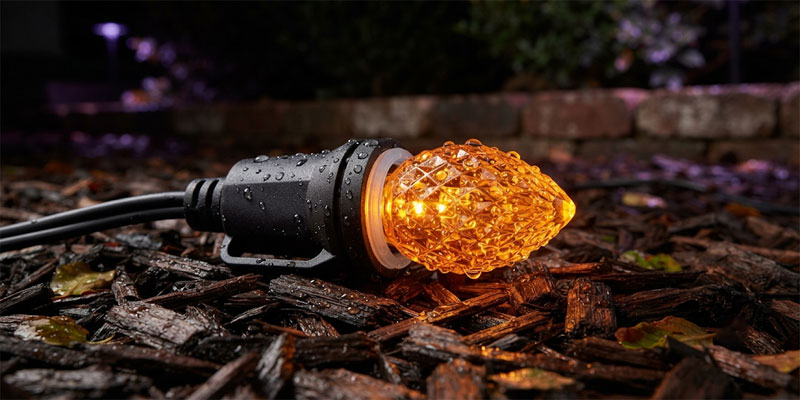 Weatherproof outdoor Halloween lights featuring heavy-gauge black wiring, sealed sockets, and durable amber LED diodes