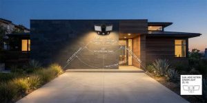 Dual head outdoor motion sensor light mounted over garage with PIR detection zone and wiring schematics