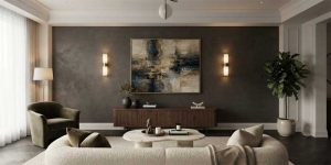 Symmetrical pair of modern brass wall sconces flanking living room artwork with warm diffused glow